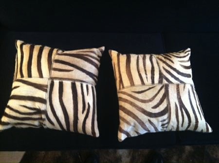 pair of zebra print cowhide pillows